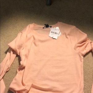 Blush pink tight long sleeve.